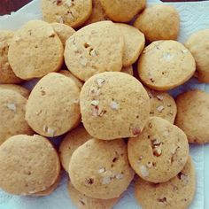 a pile of cookies sitting on top of a white towel