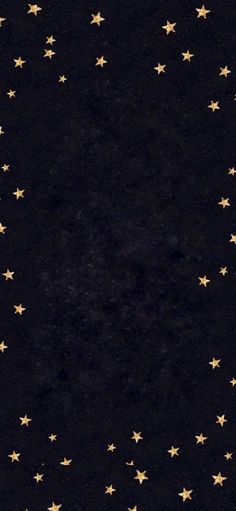 a black background with gold stars on it