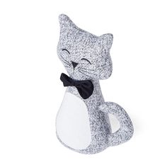 a cat figurine with a bow tie on