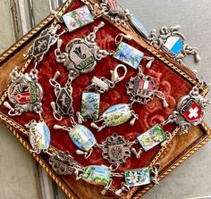 Enamel Souvenir link world traveler necklace assemblage jewelry bracelet panel Tommoores Tavern Karnten Siam Niello Bermuda  Switzerland