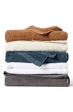 folded towels stacked on top of each other