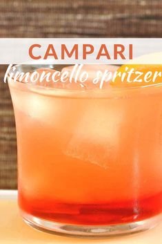 the campari cocktail is garnished with an orange slice