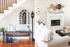 a living room filled with furniture and a fire place next to a stair case in front of a fireplace