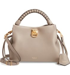 Free shipping and returns on Small Iris Leather Top Handle Bag at Nordstrom.com. Mulberry offers their take on the ideal everyday bag with the Iris: A versatile, customizable bag with drawstring gussets to allow for a personalised shape. Its modern, softly structured silhouette is enhanced with a braided top handle and shoulder strap—both removable—and the new Keystone Lock that reflects a rich history of British craftsmanship. Mulberry Iris, Mulberry Shoulder Bag, Bayswater Tote, Mulberry Handbags, New York Home, Mulberry Bag, Croc Leather, Bag Icon, Unique Bags