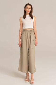 Experience the perfect blend of comfort and style with this casual elastic waist wide leg pants. This pants are designed for versatility and effortless elegance, making them a must-have for any casual occasion. Embrace a relaxed and chic look that is both comfortable and fashion-forward.Material : 75%Viscose+25%LinenElasticity : NoneSku : CL2814S24*Package : 1*PantsCare instructions:Do Not Bleach.Separate dark colors.Iron Low Heat. Versatile Solid Culottes For Spring, Khaki Wide Leg Cargo Pants, Khaki Wide Leg Ankle-length Pants With Elastic Waistband, Khaki Ankle-length Wide Leg Pants With Elastic Waistband, Versatile Solid Color Ankle-length Culottes, Summer Workwear Khaki Harem Pants, Spring Relaxed Fit Ankle-length Culottes, Versatile Wide-leg Harem Pants For Spring, Khaki Wide-leg Harem Pants