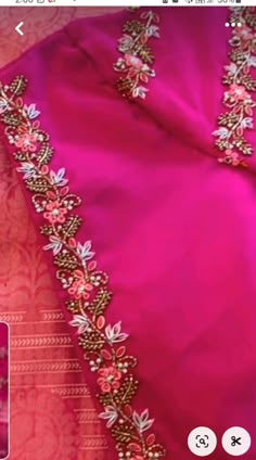 a pink dress with gold embroidery on it