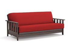 a red futon couch with wooden frame and arm rests on an isolated white background