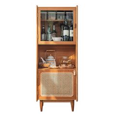 a wooden cabinet filled with bottles and glasses