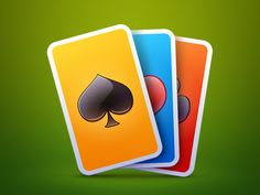 three playing cards with spades and hearts on green background - kosten stock - grafit