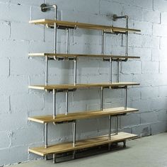 the shelves are made out of wood and metal