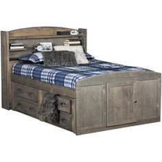 a bed with two drawers underneath it