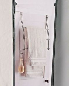 there is a towel rack in the bathroom