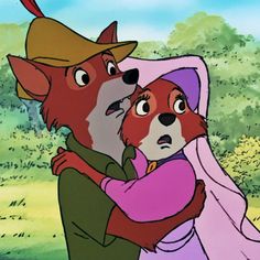 the fox and the hound is hugging each other