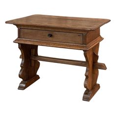 an old wooden table with one drawer on the top and two legs at the bottom