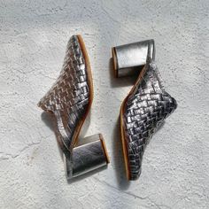 Handmade with high skilled craftsmanship - our Leia Handwoven Goatskin Leather Mules is very comfy in 7 cm heels and with non slip sole. Comes in Silver color, this hue of neutral palette color will fit in all occasion and clothes. Made from woven genuine goatskin leather for the upper and cow leather for the sole by local skilled artisans. Women's Size Charts US Size EU Size Length in CM Length in Inches 5 35 22.5 cm 8.9" 6 36 23 cm 9.1" 7 37 23.5 cm 9.25" 8 38 24.5 cm 9.7" 9 39 25 cm 9.9" 10 4 Silver Mules With Sculpted Heel And Pointed Toe, Silver Mules With Sculpted High Heel, Chic Silver Leather Mules, Silver Slip-on Party Mules, Luxury Silver Leather Mules, Kate Robinson, Woven Mules, Clogs And Mules, Silver Heels