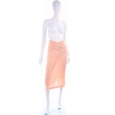 Comme des Garçons Vintage Asymmetrical Peach Rayon Skirt For Sale at 1stDibs Summer Peach Skirt, Fitted Peach Skirt For Summer, Summer Fitted Peach Skirt, Chic Fitted Peach Skirt, Fitted Apricot Bottoms For Summer, Vintage Asymmetrical Summer Skirt, Vintage Asymmetrical Skirt For Summer, Peach Lined Skirt, Comme Des Garcons Vintage