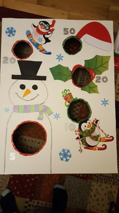 the snowman is made out of paper and cut into holes in the middle to make it look like they're ready for christmas