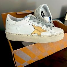 Authentic Golden Goose Hi Star White And Gold Sneakers Worn Once. Comes With Box And Dust Bag. Golden Goose Hi Star, White And Gold Sneakers, Shoes Golden Goose, Goose Shoes, Gold Sneakers, Golden Goose Shoes, Star Sneakers, Golden Goose, Womens Shoes Sneakers