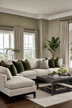 a living room filled with lots of furniture and pillows on top of a wooden floor