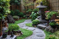 a garden with rocks and plants in it