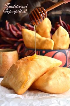 some food that is being drizzled with honey