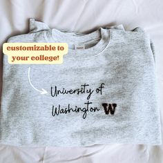 a t - shirt with the words university of washington written on it