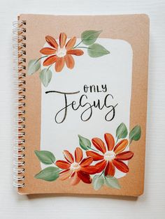 an open notebook with the words only jesus written on it