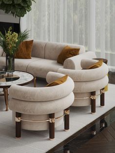 a living room with two couches and a coffee table in front of a window