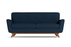 a blue couch sitting on top of a wooden frame