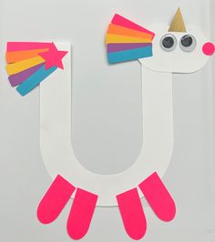 paper cut out of the shape of a unicorn