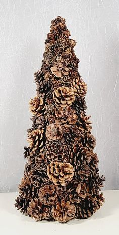 a christmas tree made out of pine cones