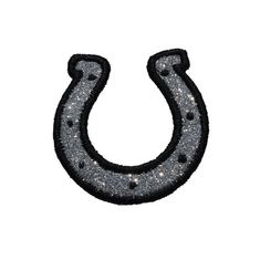 a black and silver ironed horseshoe on a white background