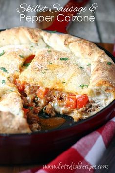 a close up of a pie in a pan on a table