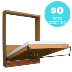 a wooden shelf with a mattress on it and a free shipping sign in the background