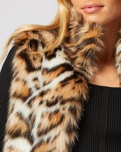 Go downtown with this cheetah-print faux fur vest. This revered animal print is a neutral in our book, so wear it with everything. Jumpsuit Jacket, Faux Fur Vest, Faux Fur Vests, Fur Vest, Cheetah Print, Wear It, Faux Fur, Animal Print, Shopping Outfit