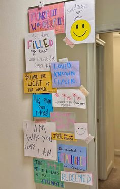 a bulletin board that has been decorated with different types of notes and words on it