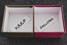 an open box with two pieces of paper in it that say keep declutter