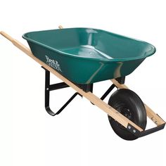 a green wheelbarrow with wooden handle