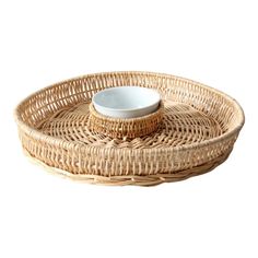 a wicker tray with a bowl on it