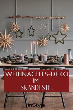 an image of a table with candles and decorations on it in the background text reads, weihnachts - deko im