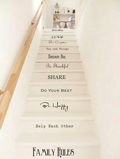 stairs with family rules painted on them in black and white, as well as the words below