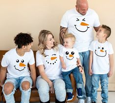 These super soft and super comfy Funny Christmas Family matching shirts with snowman faces are the perfect Christmas party outfit! These could be you favorite ones for your Christmas family reunion group shirts. Wear them as Holiday Apparel or fill your Christmas basket gift - that's awesome idea! THIS LISTING IS FOR ONE SHIRT. TO MAKE A SET, PLEASE ADD THE SHIRTS YOU WANT TO YOUR CART. Our t-shirts and bodysuits are SUPER soft and SUPER comfy.  Mama Shirts Sizing is UNISEX and will be a relaxed fit with longer length for women, and fitted chest and bicep for men. Ladies, we recommend ordering your normal size for a relaxed fit, but sizing down if between sizes or prefer a more fitted look.  These are unisex sized, so the fit will be looser if you order your normal women's size. We recomme Holiday Shirt Family, Family Reunion Christmas, Group Vacation Shirts, Holiday Shirt Ideas, Group Vacation, Family Christmas Outfits, Family Matching Shirts, Snowman Shirt, Christmas Basket