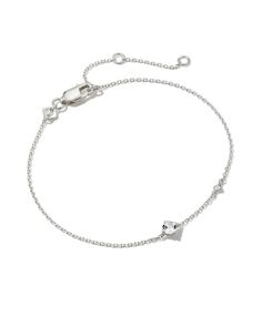 Meet this delicate and dainty layer that’s sure to delight. The Maisie Sterling Silver Delicate Chain Bracelet in White Topaz is our most minimal birthstone style, perfect for personalizing your look with elevated materials. Speaking of personalization, this bracelet features an adjustable closure for a custom fit. White Topaz represents April birthdays, symbolizing health, balance, and positivity. Metal Sterling Silver Why Sterling Silver? Our Sterling Silver collection features elevated styles Kendra Scott Silver, Silver Collection, Delicate Chain, Demi Fine Jewelry, Sterling Silver Necklace Pendants, Silver Pendant Necklace, White Topaz, Kendra Scott, Birthstone Jewelry