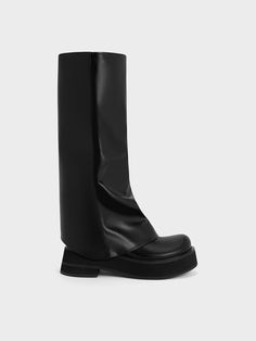 The leg-warmer trend is having a moment in fashion right now - and these Cove knee-high boots are certainly a pair that aces that trend with their all-in-one design. Featuring a baggy-like design coupled with the soft cocooning contours of the platform soles, these shoes will add a distinct aesthetic to your overall look, that is almost reminiscent of the Harajuku punk pop fashion. Look a little closer, and you will notice ruched folds that make these boots extra special. Platform Boots Knee High, Harajuku Punk, Leg Warmer, Faux Leather Heels, Size Chart For Kids, Charles Keith, Brunch Outfit, Boots Knee, Platform Boots