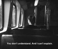 black and white photograph of woman on train with text that reads you don't understand, and i can't explain