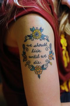 a woman with a tattoo on her arm saying, we should not be afraid to see the