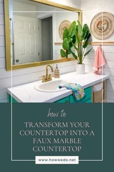 a bathroom with a mirror, sink and plants on the counter in front of it