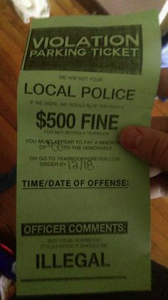 someone holding up a green ticket for parking tickets to their local police office, which they are offering