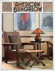 a chair and table in a room with an american bulglow sign on the wall