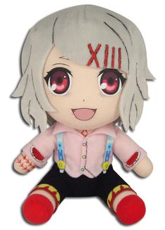 an anime doll with red eyes and white hair sitting on top of a white surface